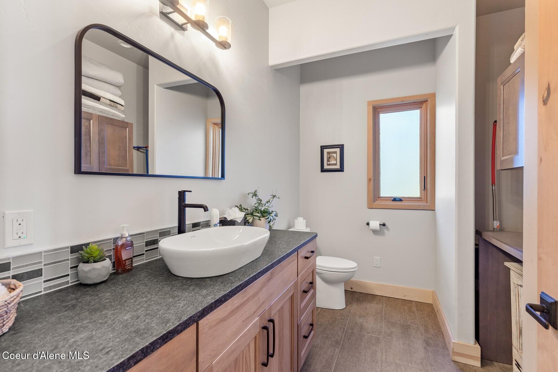 14318 North Waters Edge Court Hayden, ID 83835 - Photo 25 of 49 The powder bath main level