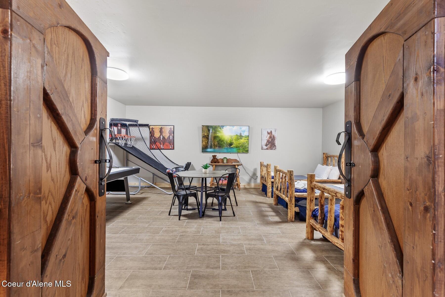 14318 North Waters Edge Court Hayden, ID 83835 - Photo 34 of 49 Lower Level Kids Room