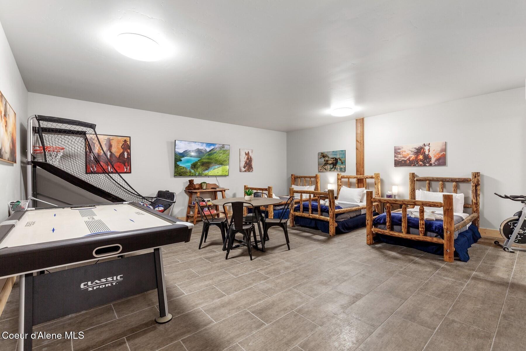 14318 North Waters Edge Court Hayden, ID 83835 - Photo 35 of 49 Bunk, games, exercise room