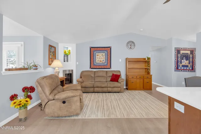 a bedroom with furniture and painting on the wall