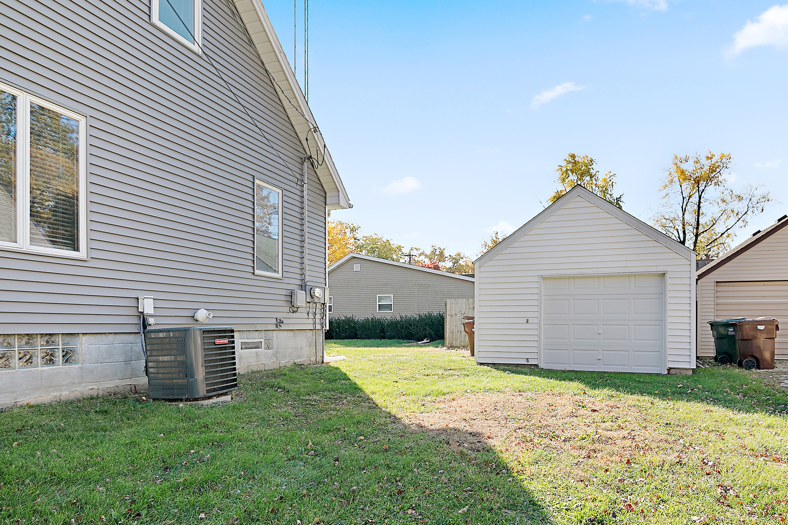 290 East 1st Avenue Clifton, IL 60927 - Photo 20 of 20 a view of a house with a yard and garage