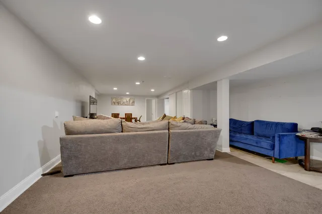 a living room with furniture and a couch