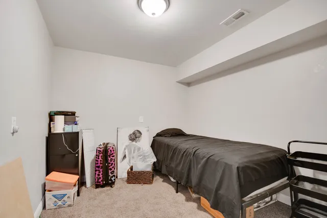 a bathroom with a sink toilet and mirror