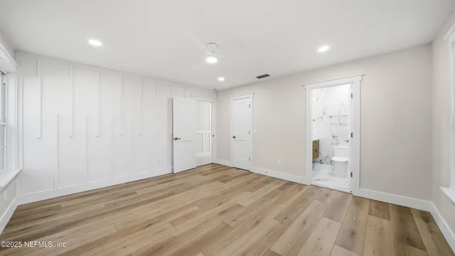 a bathroom with a shower and a tub