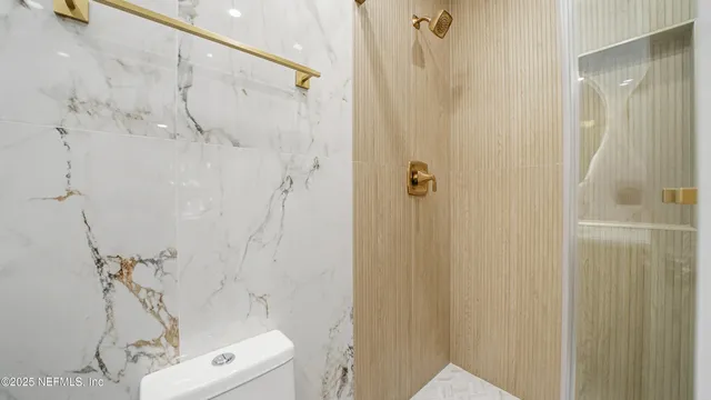 a view of an empty walk in closet