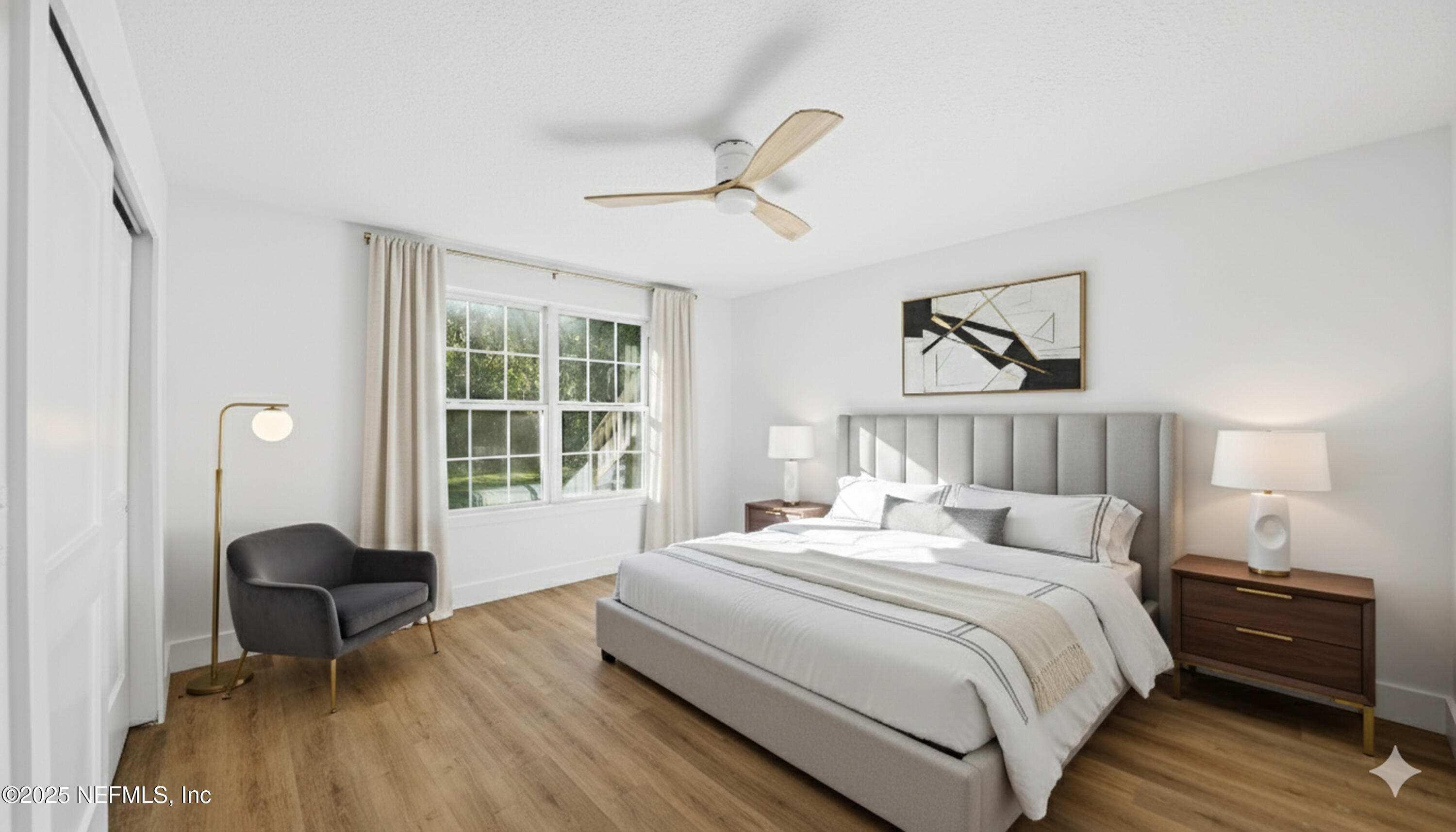 3217 Turtle Creek Road St. Augustine, FL 32086 - Photo 33 of 57 a bedroom with a bed and a chair