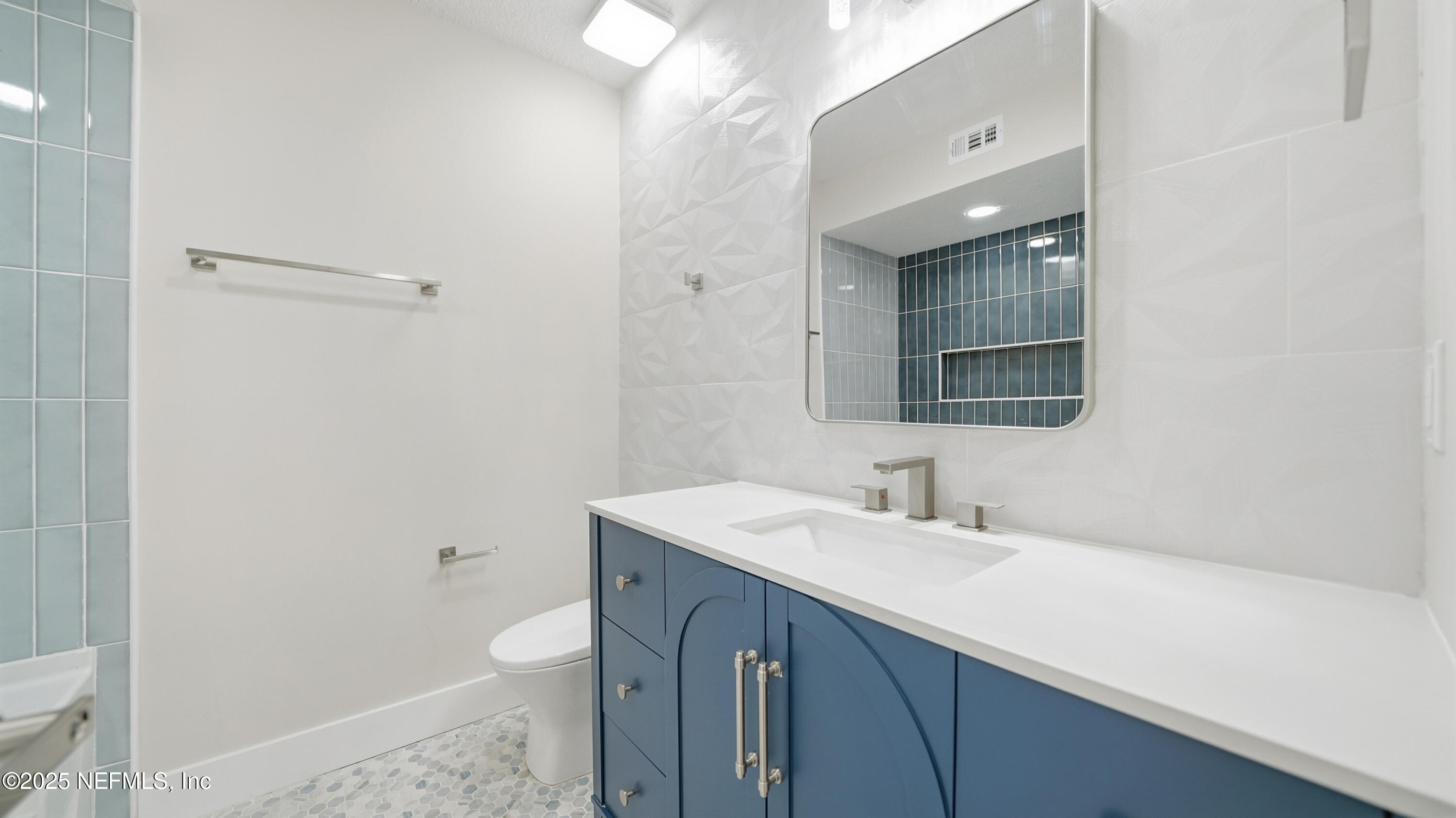 3217 Turtle Creek Road St. Augustine, FL 32086 - Photo 36 of 57 a bathroom with a sink a toilet and shower