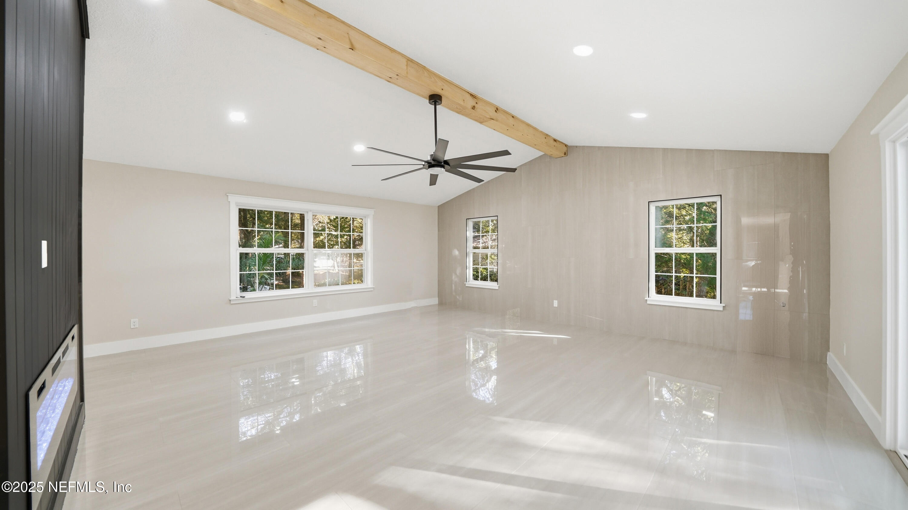 3217 Turtle Creek Road St. Augustine, FL 32086 - Photo 6 of 57 a view of an empty room with a window