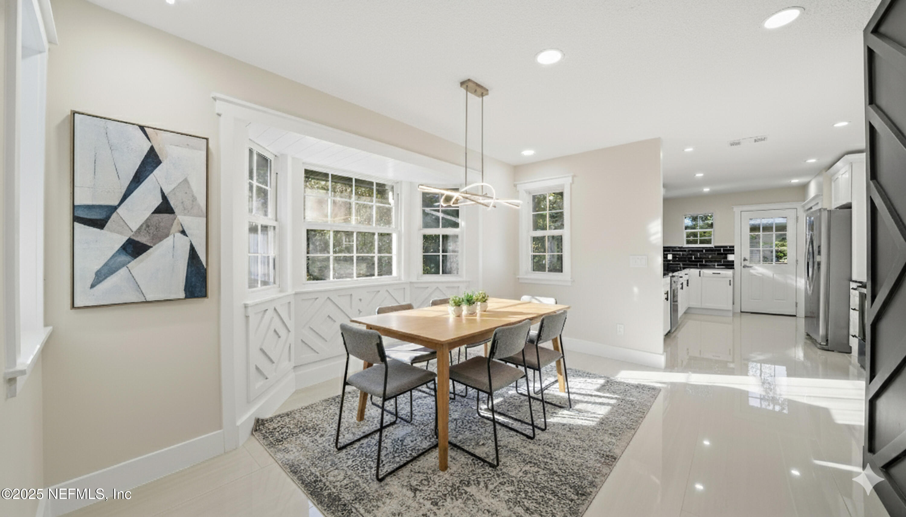 3217 Turtle Creek Road St. Augustine, FL 32086 - Photo 9 of 57 a dining room with furniture and window