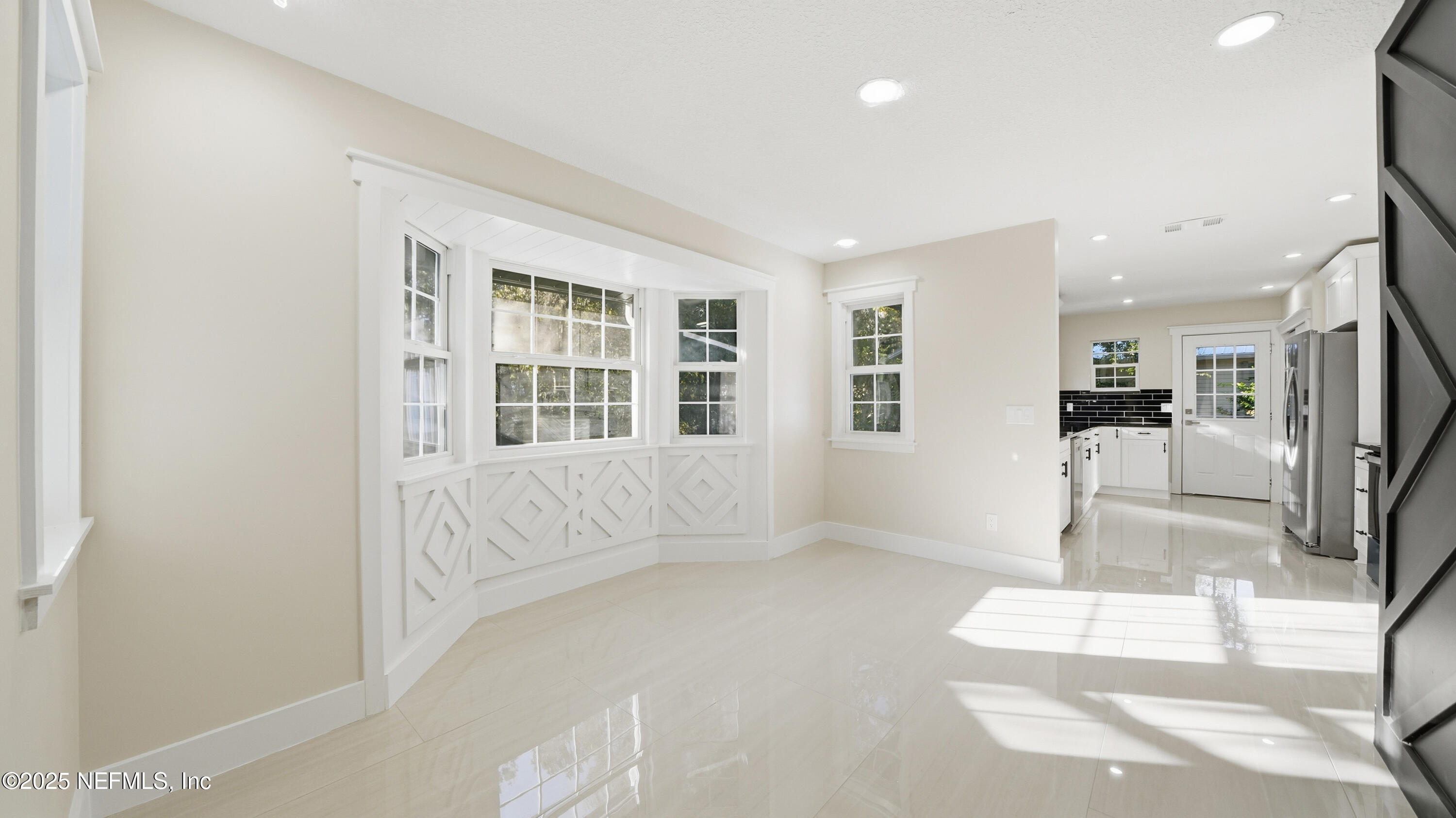 3217 Turtle Creek Road St. Augustine, FL 32086 - Photo 10 of 57 a view of an entryway with wooden floor and a livingroom
