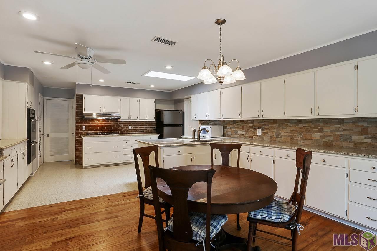4560 Bennett Drive Baton Rouge, LA 70808 - Photo 8 of 20 Breakfast Area into Kitchen