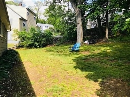 116 Upton Road Waltham, MA 02452 - Photo 15 of 15 a view of backyard of house with green space