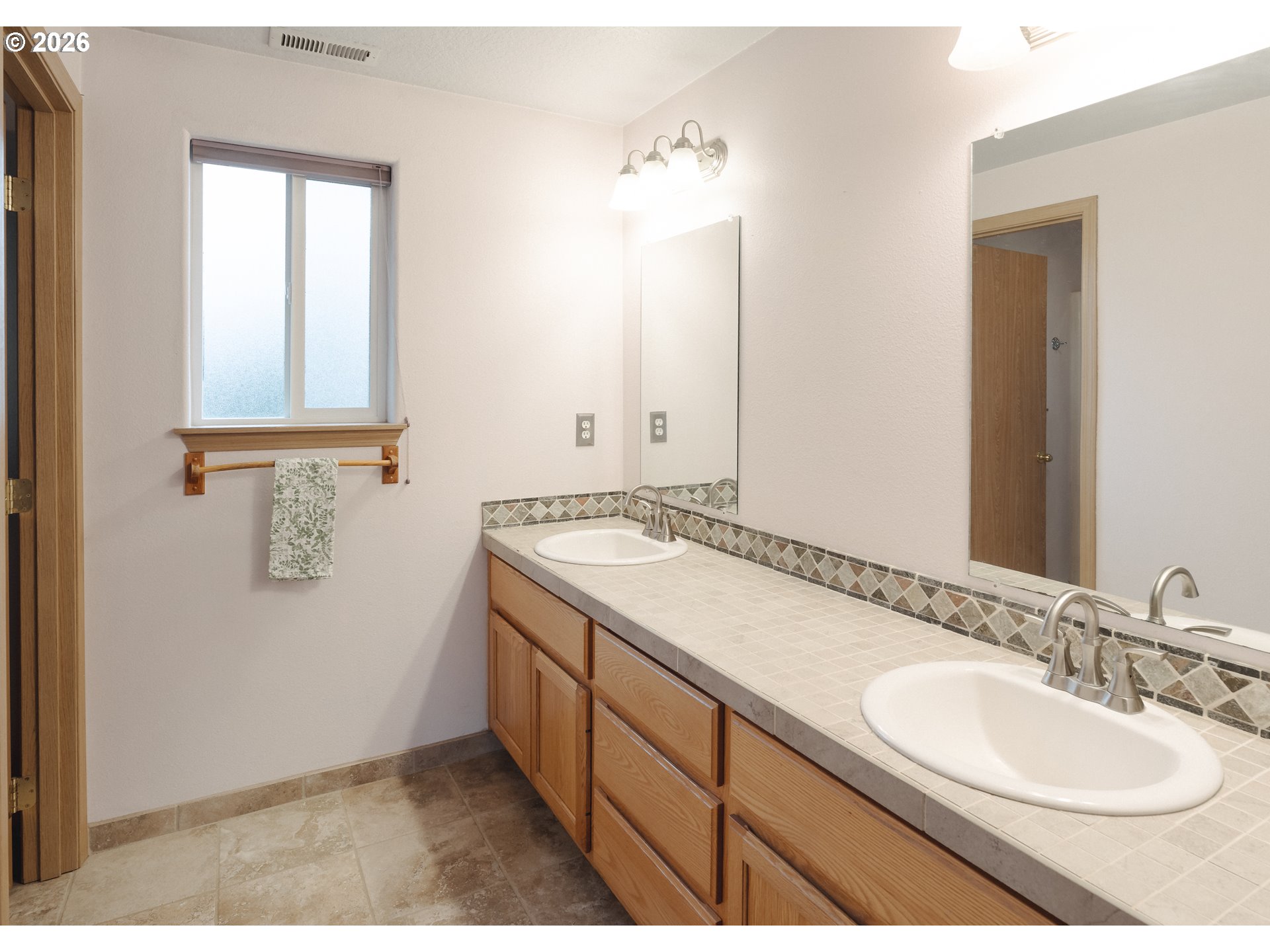 1254 Crystal Lane Lafayette, OR 97127 - Photo 14 of 34 a bathroom with a sink and a mirror