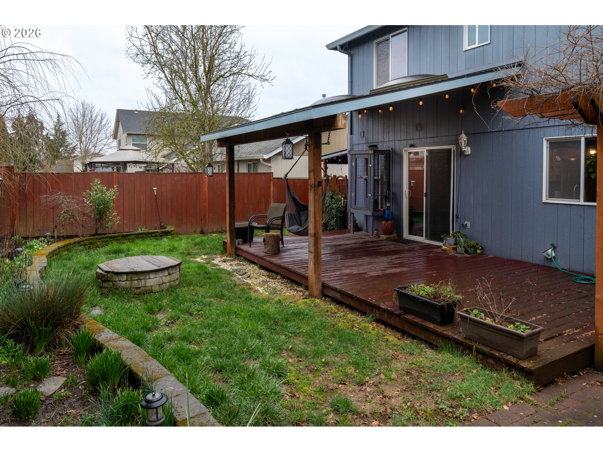 1254 Crystal Lane Lafayette, OR 97127 - Photo 25 of 34 a view of a chair and table in backyard of the house