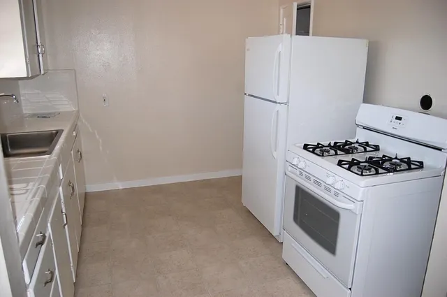 a bathroom with a sink vanity and a mirror