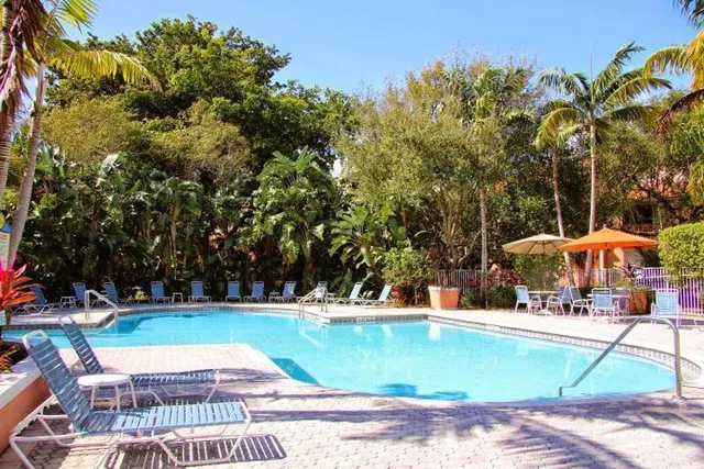 a view of swimming pool with a yard