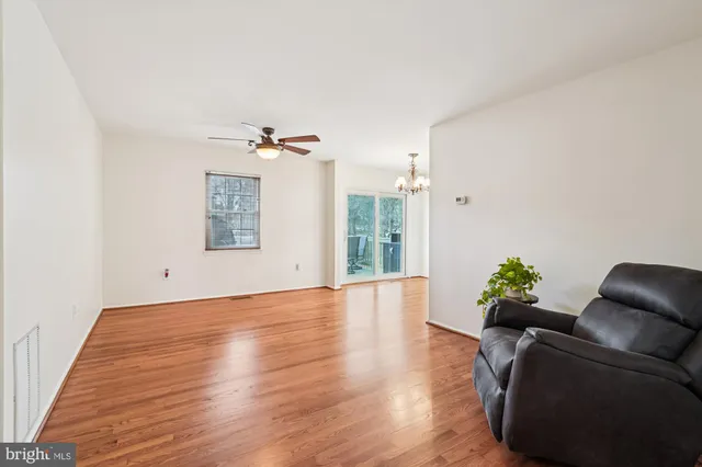 a view of livingroom with furniture and wooden floor