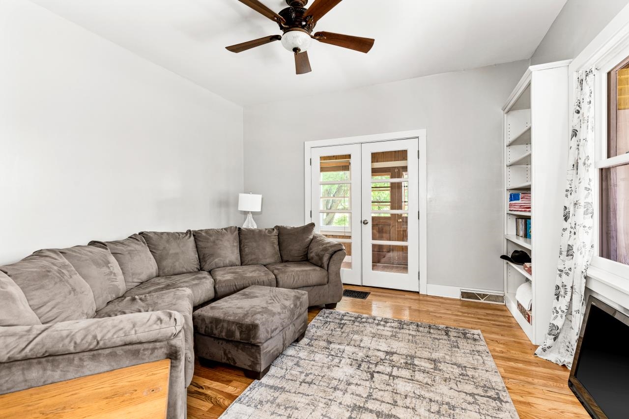 33415 Jackson Road Askov, MN 55704 - Photo 30 of 91 Living area featuring ceiling fan, french doors, and light wood-style floors