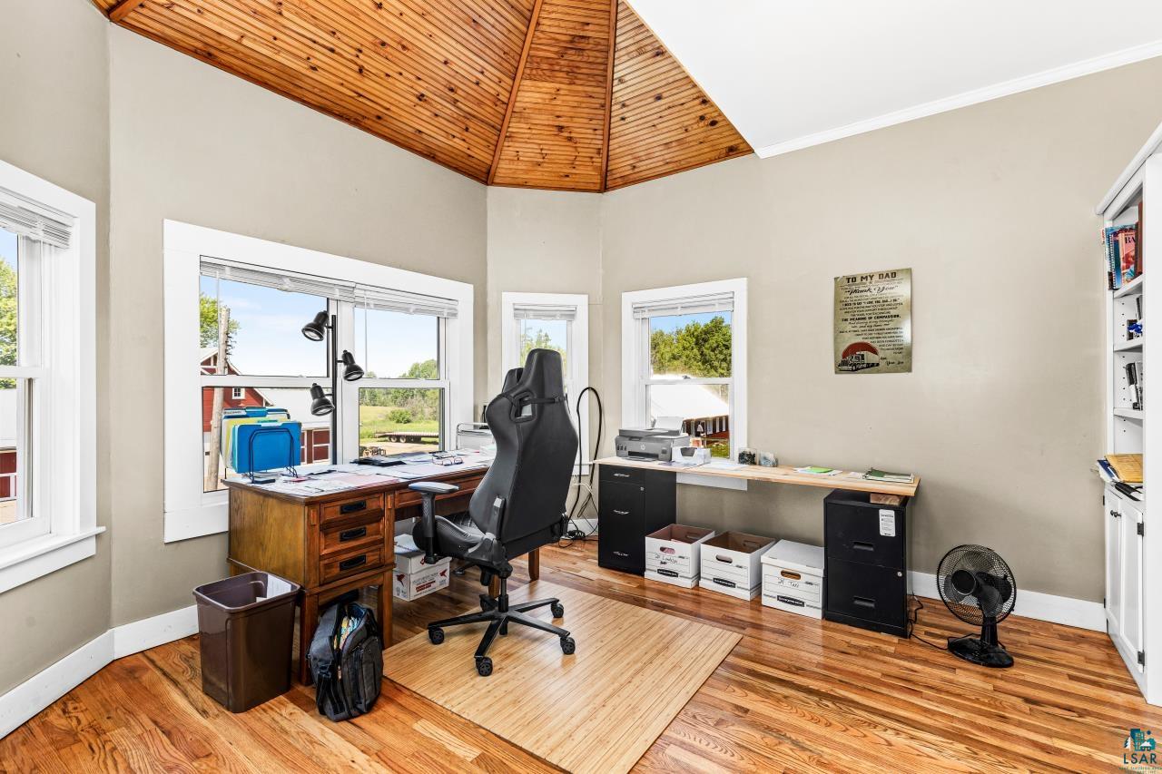 33415 Jackson Road Askov, MN 55704 - Photo 52 of 91 Office area with light wood-type flooring, high vaulted ceiling, wooden ceiling, and ornamental molding