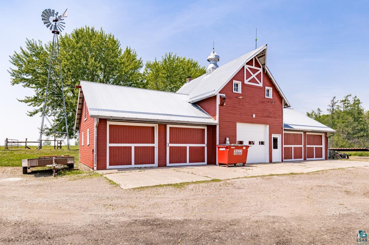 33415 Jackson Road Askov, MN 55704 - Photo 57 of 91 Garage featuring a detached garage and driveway