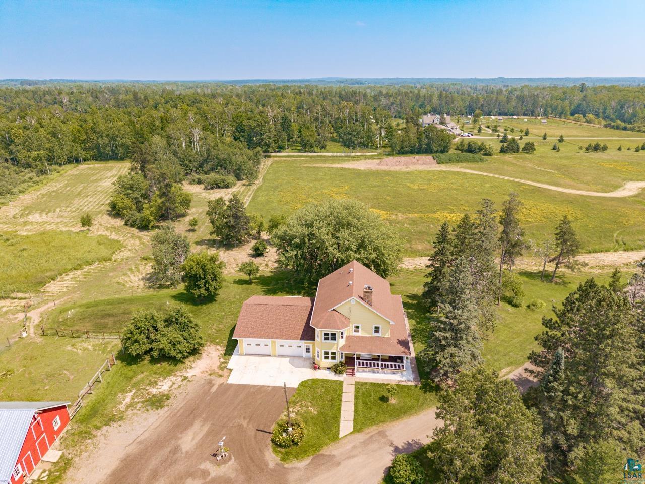 33415 Jackson Road Askov, MN 55704 - Photo 77 of 91 Aerial view of sparsely populated area with a forest