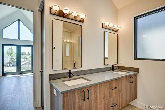 a bathroom with a sink and a mirror