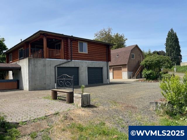 9630 Rickreall Road Rickreall, OR 97371 - Photo 2 of 3 a view of a house with a yard and garage