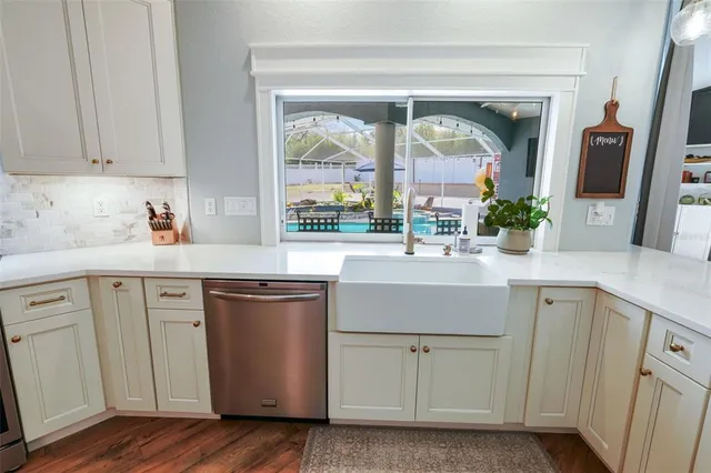 a living room with furniture rug and window