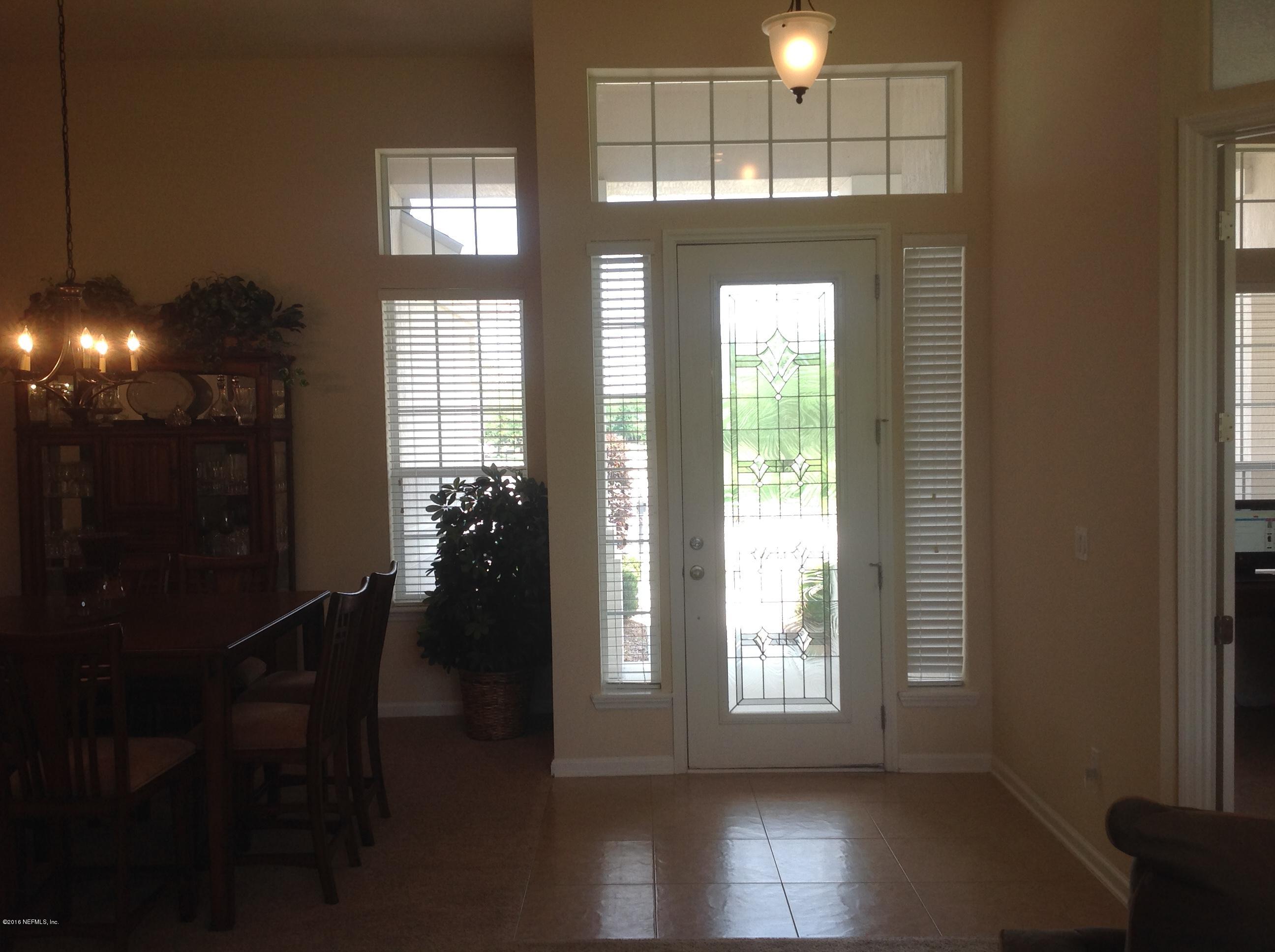 239 Holland Drive St. Augustine, FL 32095 - Photo 3 of 46 a view of entryway and hall with wooden floor