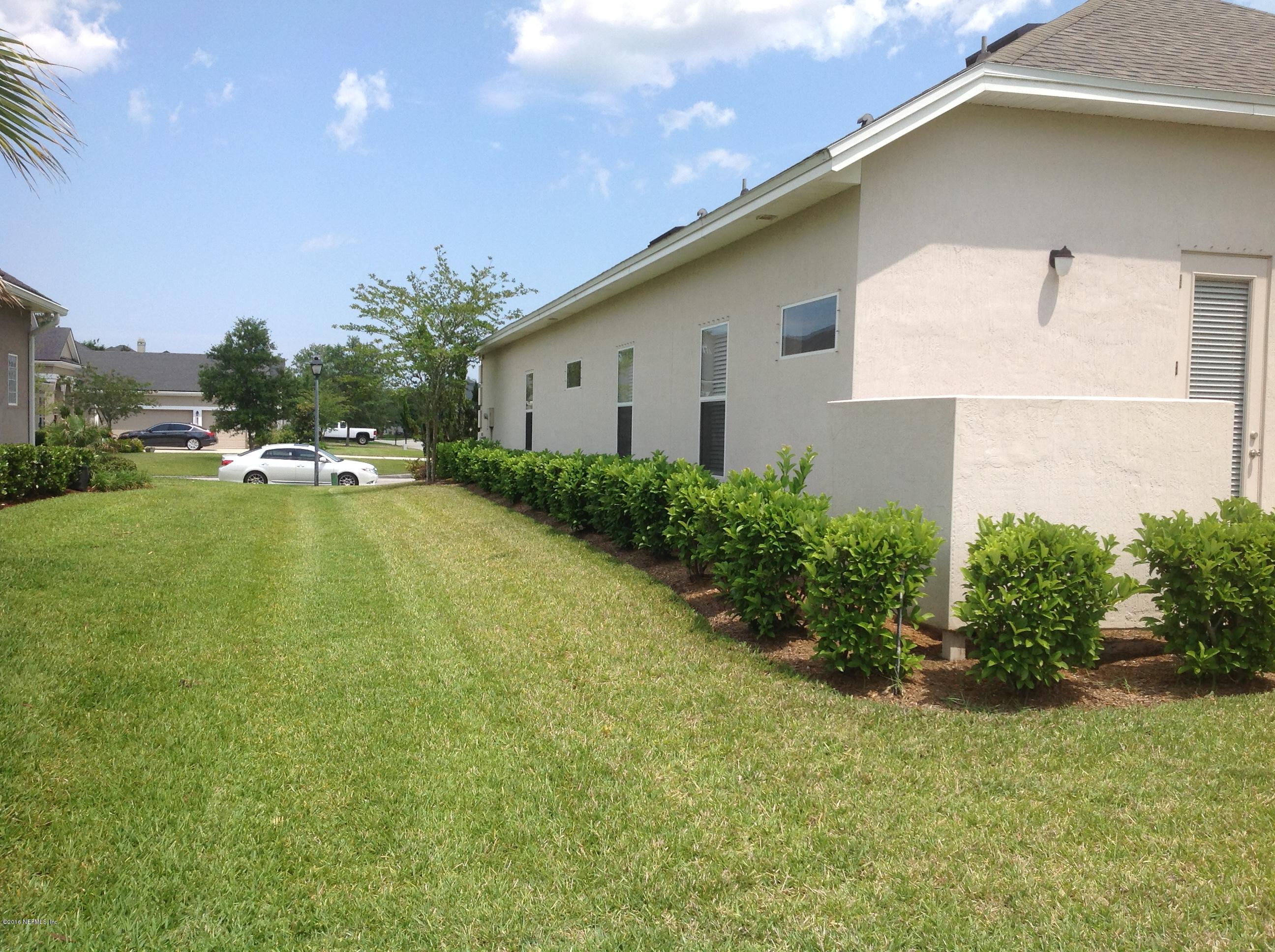 239 Holland Drive St. Augustine, FL 32095 - Photo 32 of 46 a view of a house with pool and chairs