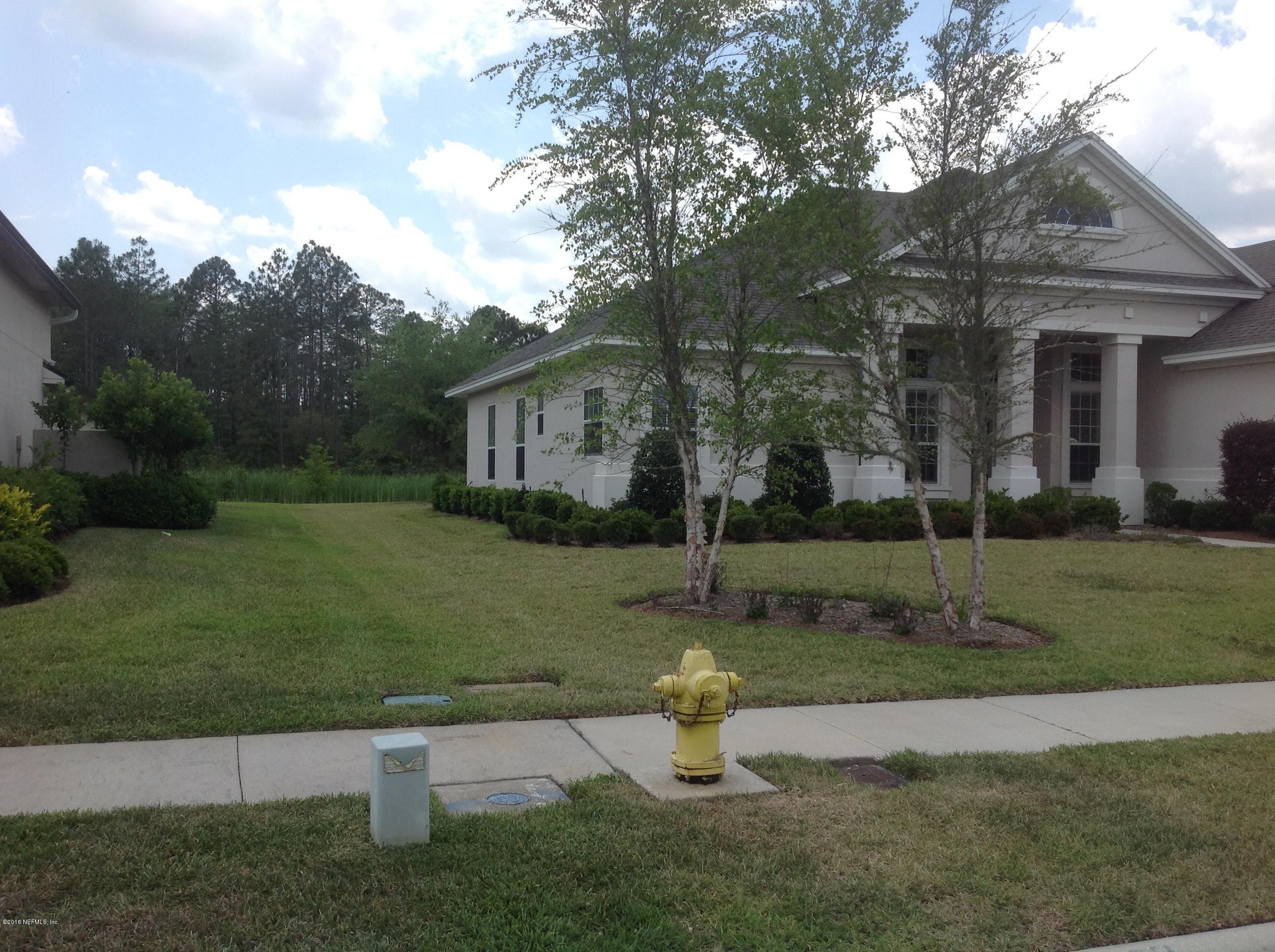239 Holland Drive St. Augustine, FL 32095 - Photo 41 of 46 a view of a house with a yard