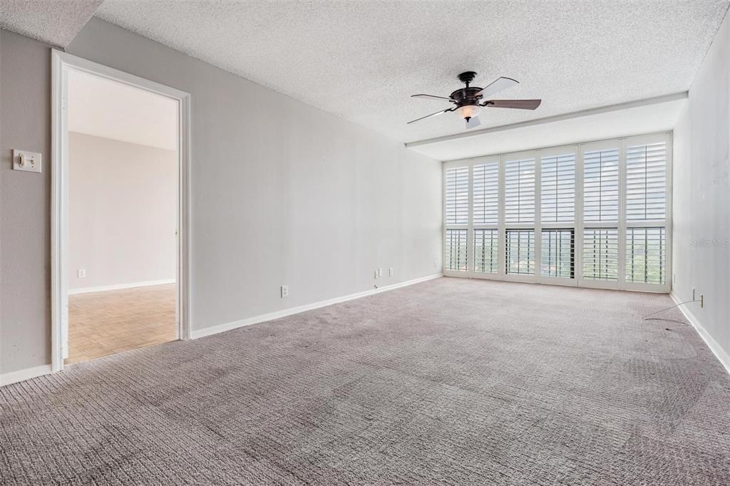 3211 West Swann Avenue, Unit 907 Tampa, FL 33609 - Photo 15 of 32 a view of an empty room with a window