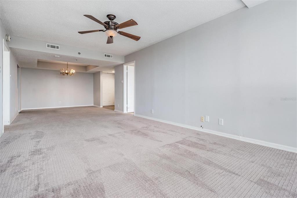 3211 West Swann Avenue, Unit 907 Tampa, FL 33609 - Photo 19 of 32 wooden floor in an empty room