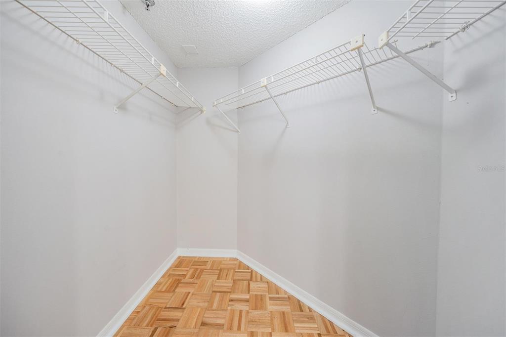 3211 West Swann Avenue, Unit 907 Tampa, FL 33609 - Photo 24 of 32 a view of a room with racks on the wall