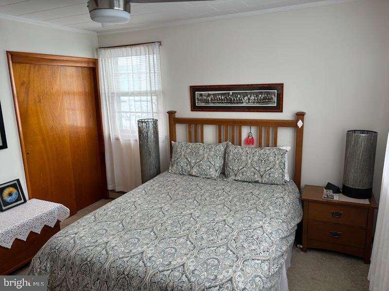 53 Circle Drive Earleville, MD 21919 - Photo 17 of 35 a bedroom with a bed and flat screen tv