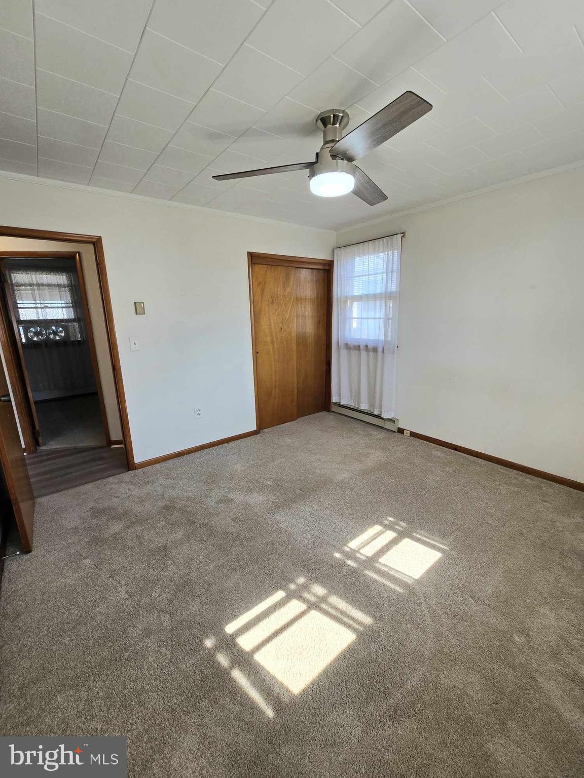53 Circle Drive Earleville, MD 21919 - Photo 18 of 35 a view of a livingroom with a ceiling fan and window