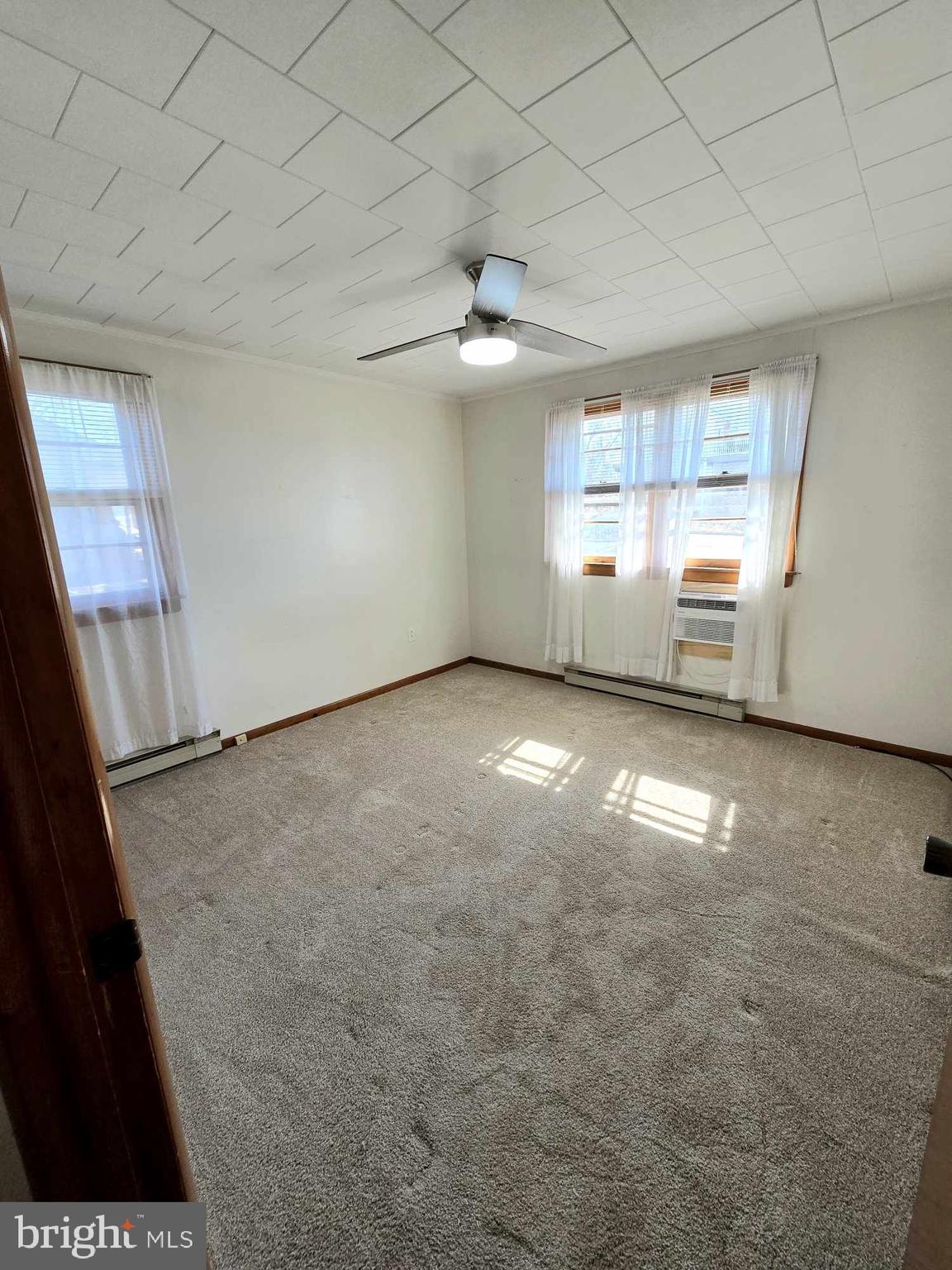 53 Circle Drive Earleville, MD 21919 - Photo 19 of 35 a view of a livingroom with a ceiling fan and window