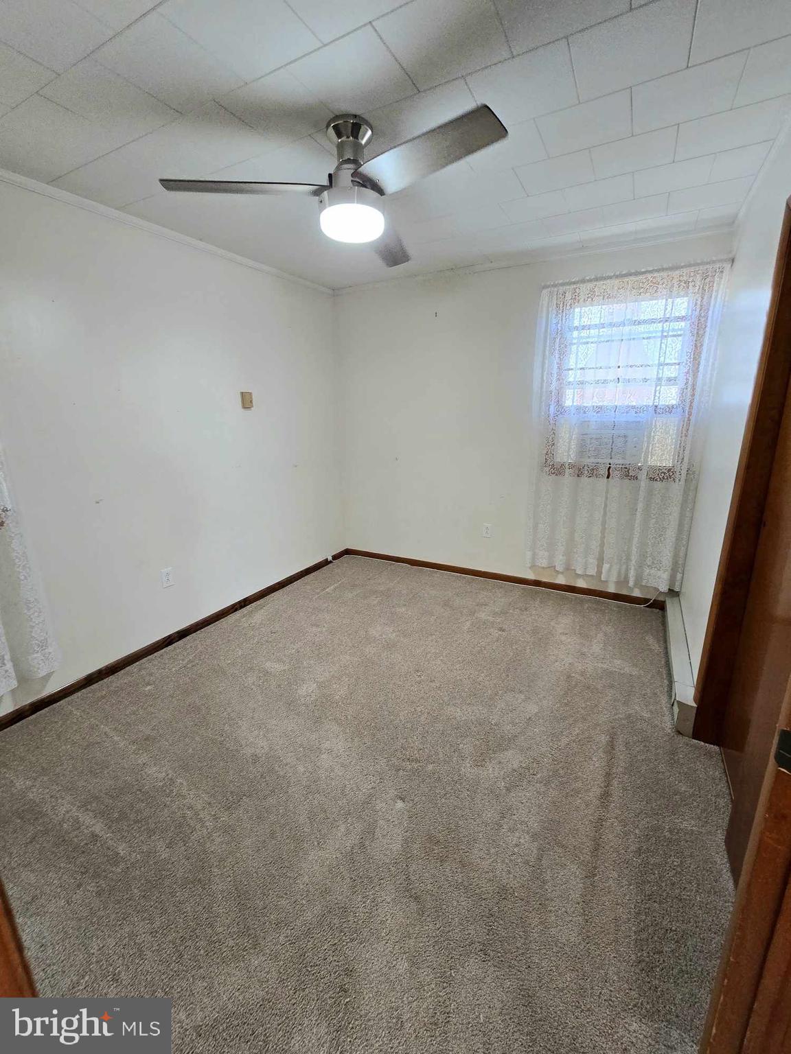 53 Circle Drive Earleville, MD 21919 - Photo 21 of 35 a view of an empty room with a window