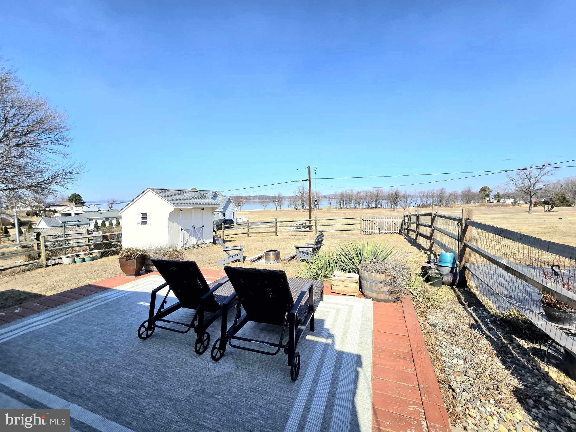 53 Circle Drive Earleville, MD 21919 - Photo 24 of 35 a balcony with a table and chairs