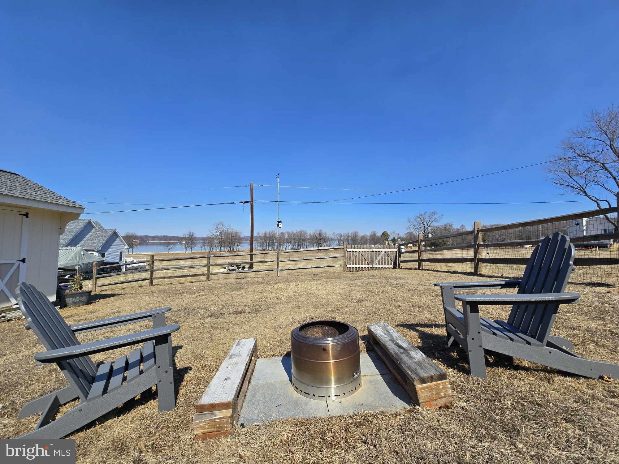 53 Circle Drive Earleville, MD 21919 - Photo 25 of 35 a view of a swimming pool with a lounge chairs