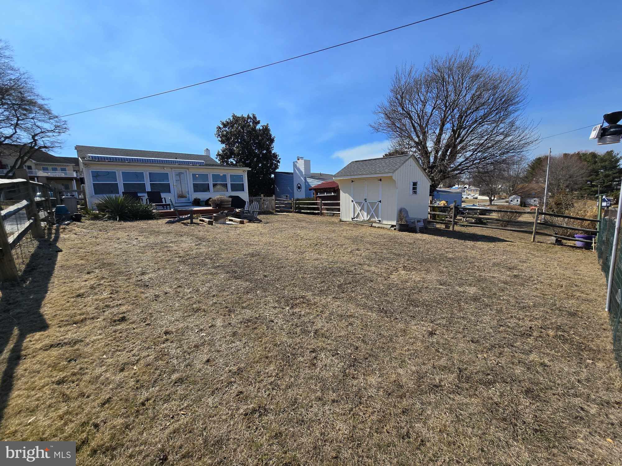 53 Circle Drive Earleville, MD 21919 - Photo 27 of 35 a view of a house with a yard covered in snow