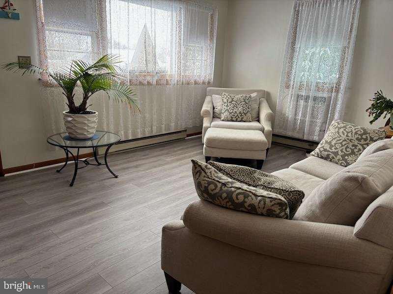 53 Circle Drive Earleville, MD 21919 - Photo 4 of 35 a living room with furniture and a potted plant