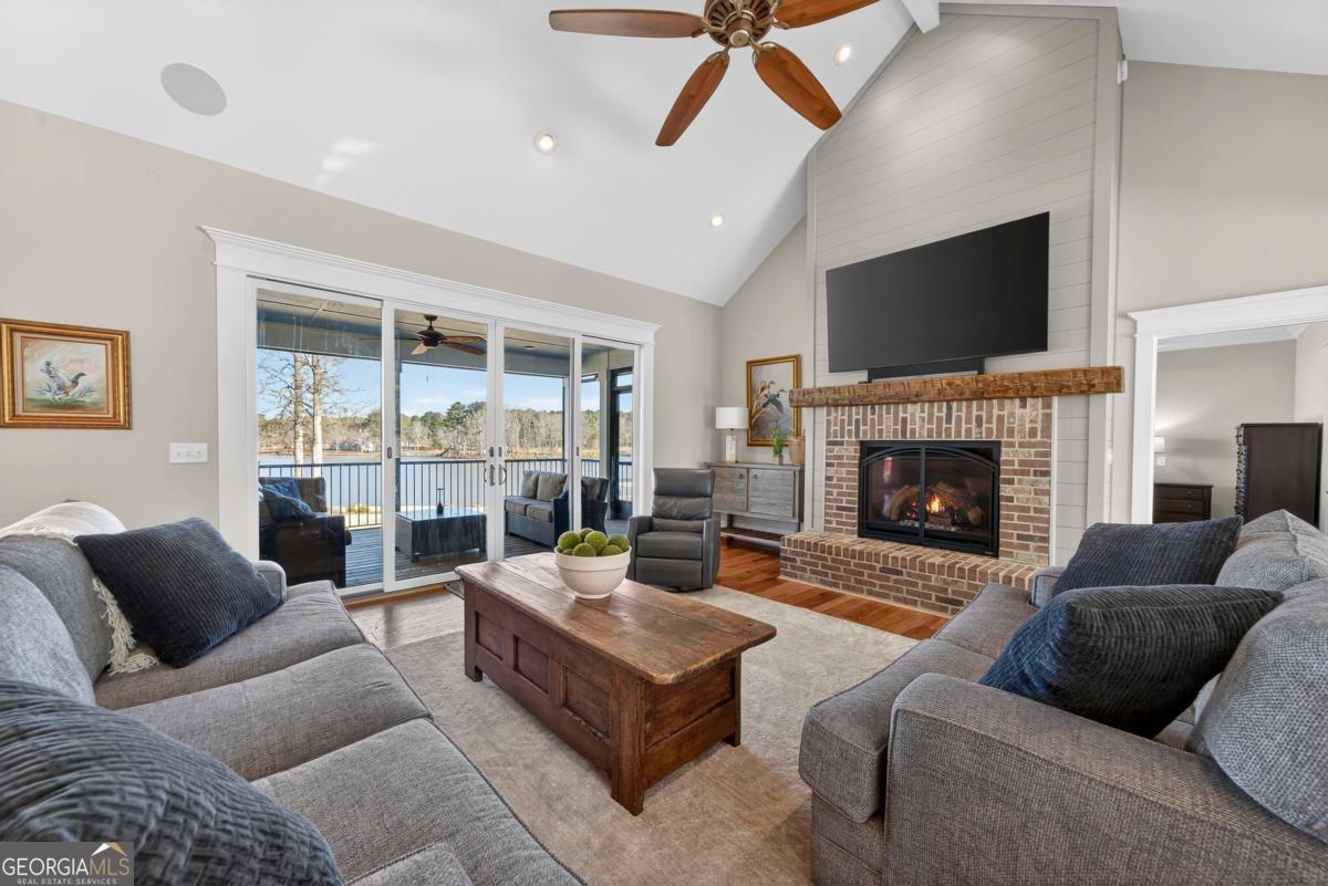 1010 Azalea Lane Buckhead, GA 30625 - Photo 11 of 67 a living room with furniture fireplace and flat screen tv