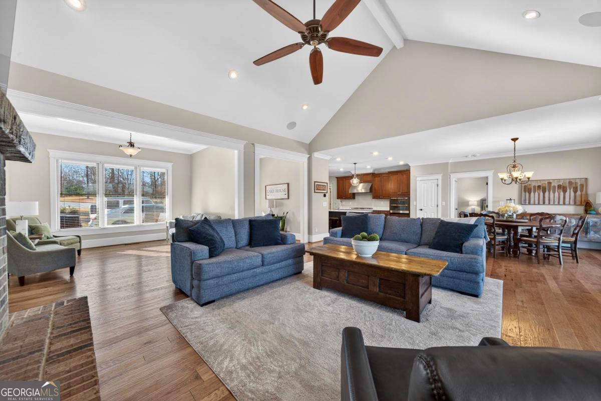 1010 Azalea Lane Buckhead, GA 30625 - Photo 14 of 67 a living room with furniture and a large window