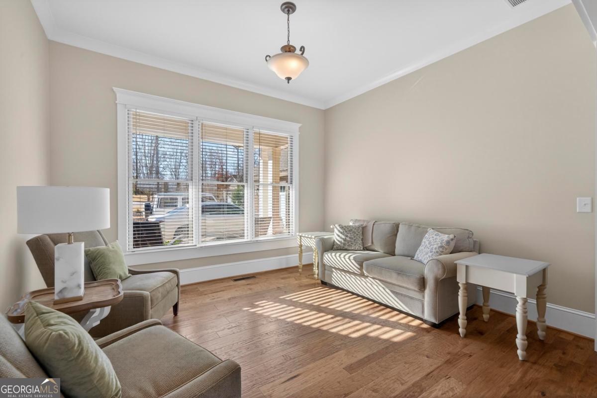 1010 Azalea Lane Buckhead, GA 30625 - Photo 19 of 67 a living room with furniture and a window