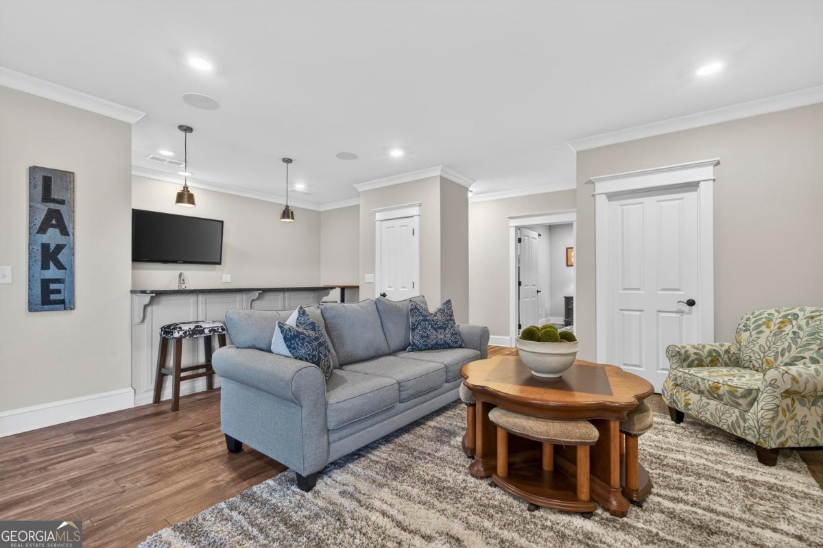 1010 Azalea Lane Buckhead, GA 30625 - Photo 40 of 67 a living room with furniture and a flat screen tv
