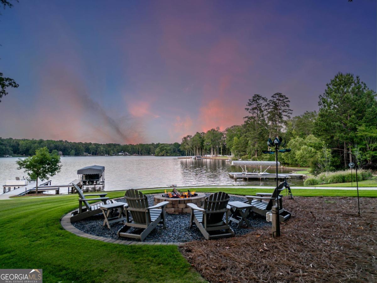 1010 Azalea Lane Buckhead, GA 30625 - Photo 4 of 67 a view of a table and chairs in the garden