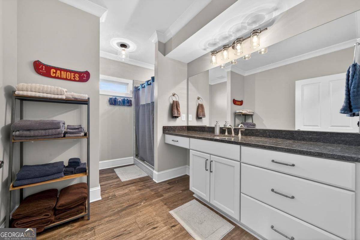1010 Azalea Lane Buckhead, GA 30625 - Photo 49 of 67 a kitchen with granite countertop a sink and cabinets