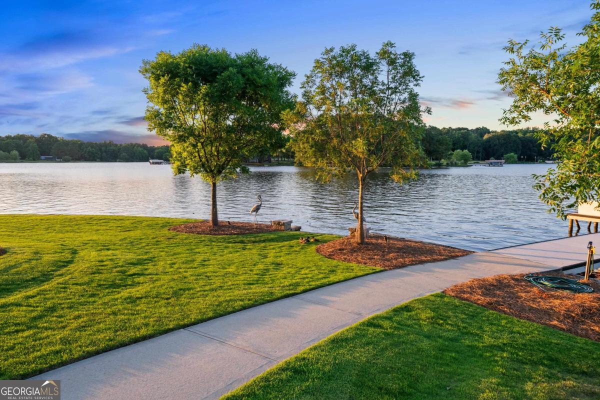 1010 Azalea Lane Buckhead, GA 30625 - Photo 55 of 67 a view of a lake with a yard