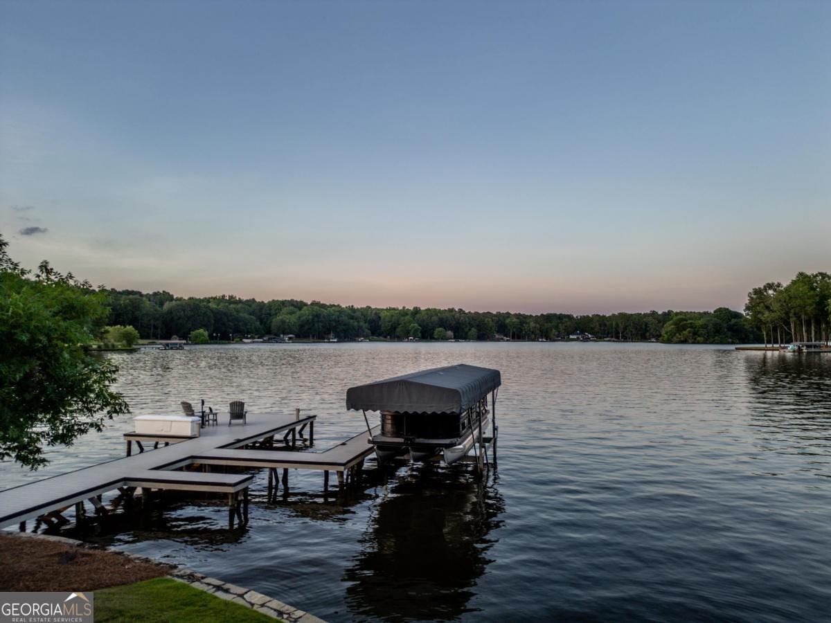 1010 Azalea Lane Buckhead, GA 30625 - Photo 60 of 67 a view of a lake with outdoor seating space and lake view